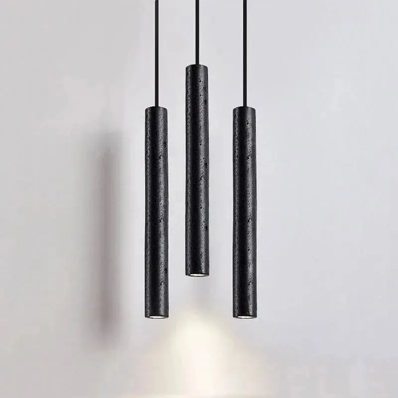 Suspension LED ultra-fine en pierre noire perforée - Design minimaliste modern.