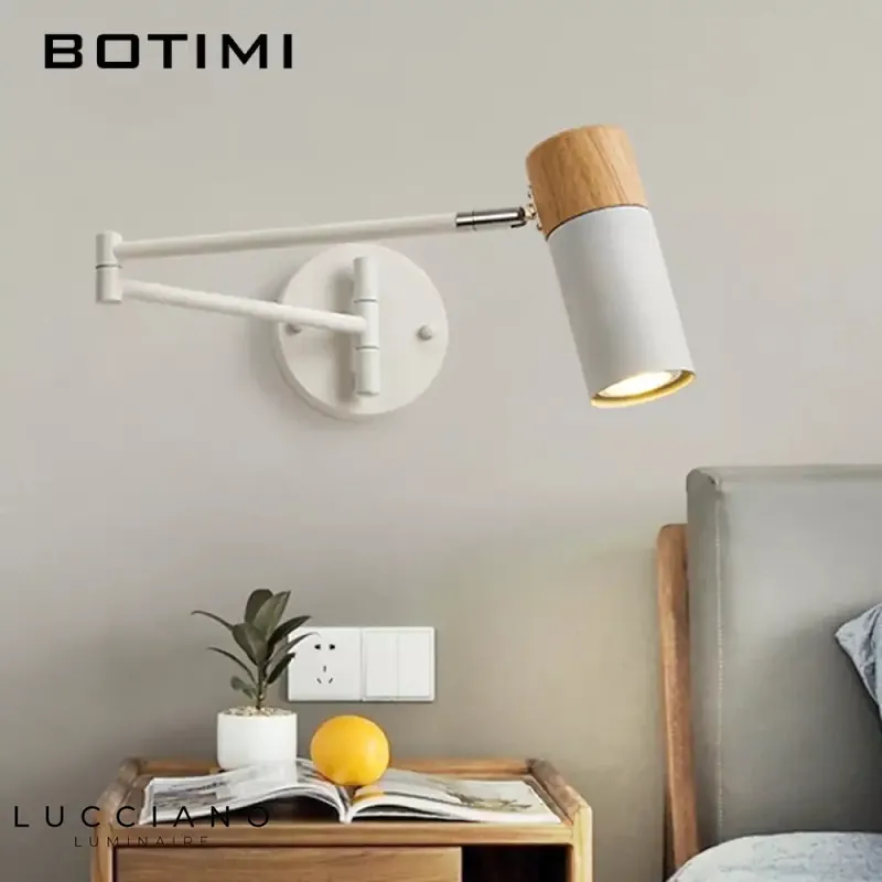 Adjustable wall lamp for hospitality desk