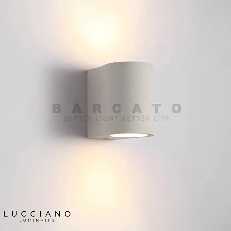Unique and trendy cement wall light.