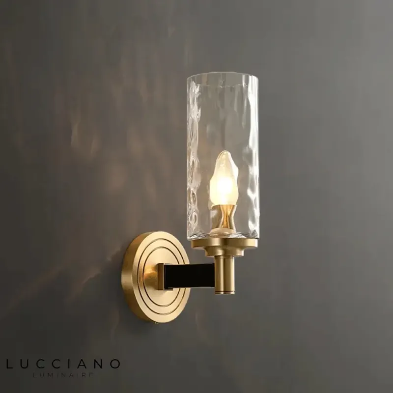 Copper double-head wall light with fluid design.
