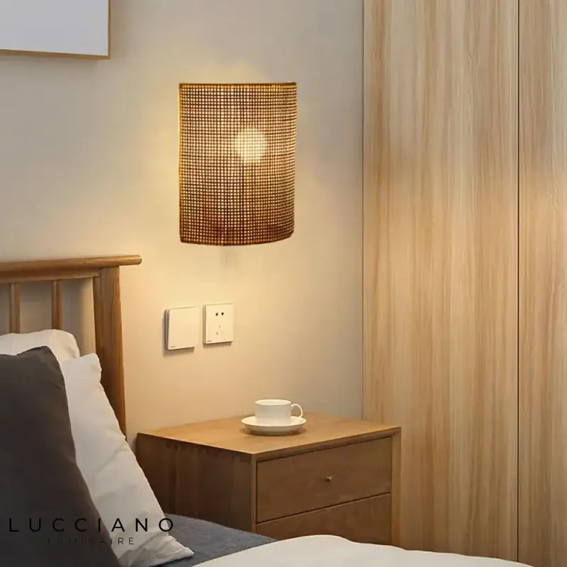 Contemporary rattan wall light with a clean design
