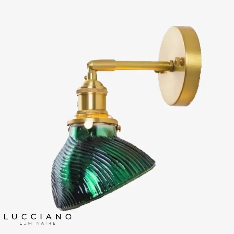 Designer gold wall lamp, luminous emerald elegance.