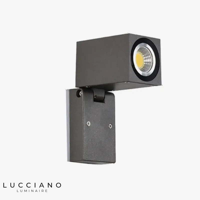 Wall light with swivel cubic design spot