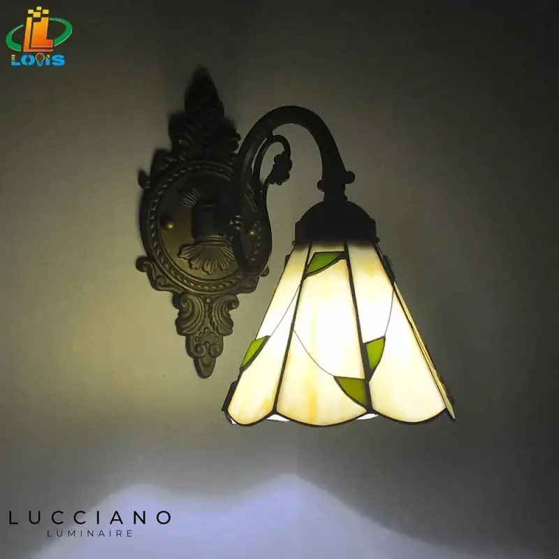 Artistic iridescent blue mermaid wall light.