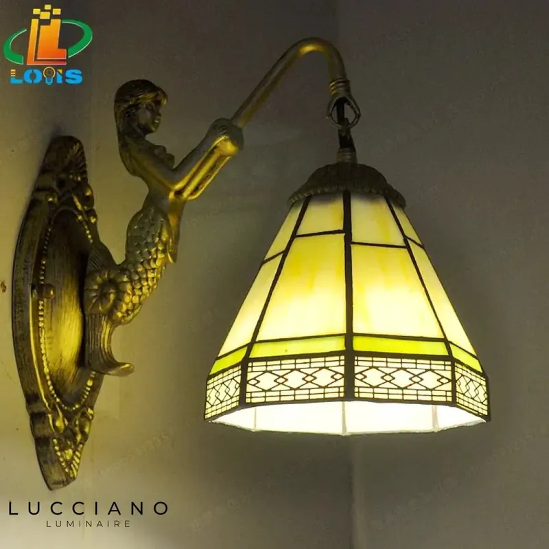Bright and warm baroque style wall light
