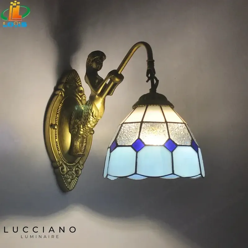 Stylish navy blue fish wall light decor.