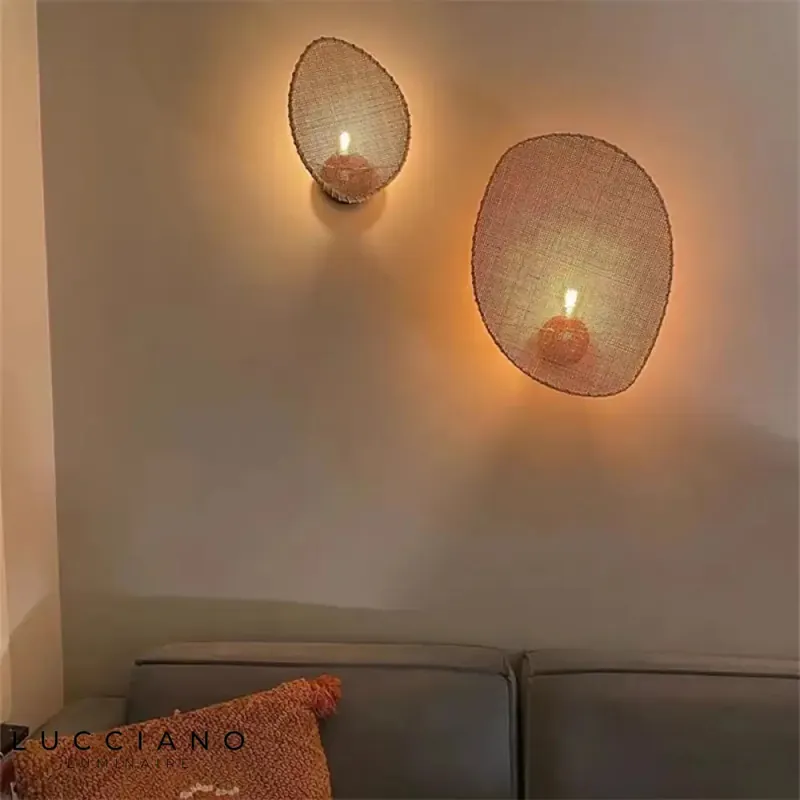 Wabi-sabi minimalist artisanal wall light.