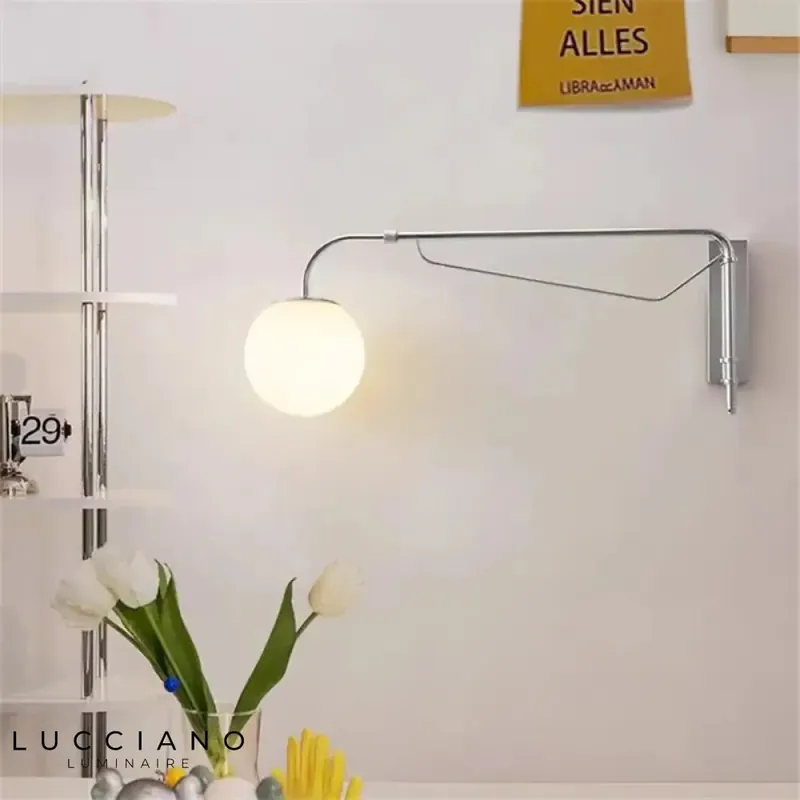 Stylish modern articulated LED wall light.