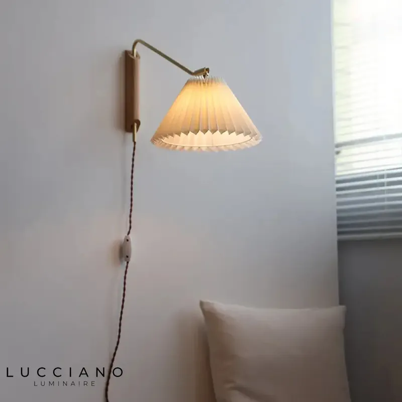 Copper wall light, modern swivel design.