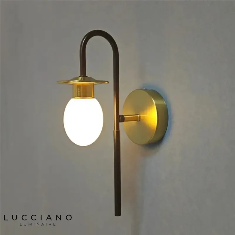 Sleek modern white designer wall light.