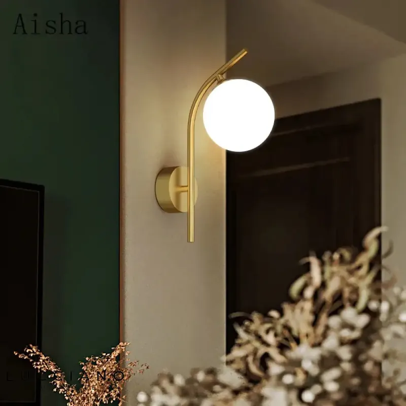 Suspended clear ball copper wall light