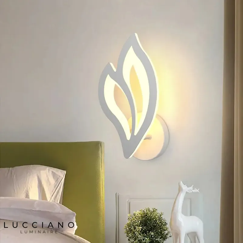 designer LED wall light with luminous leaf.