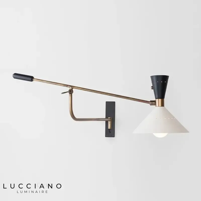 Designer metal wall light with extendable arm