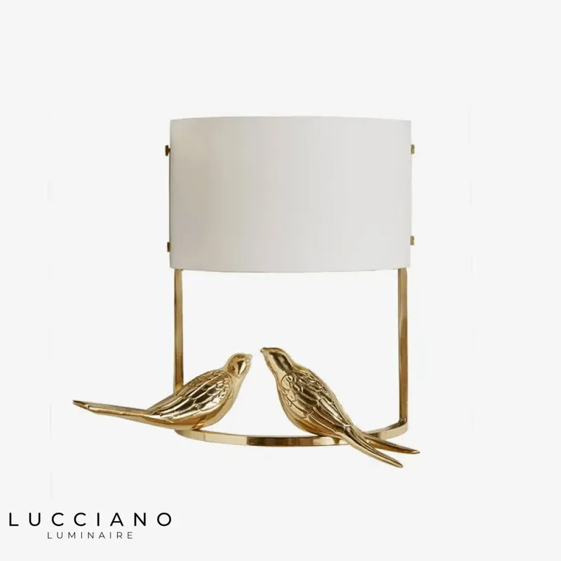 Stylish LED wall light with gold finish and bird design