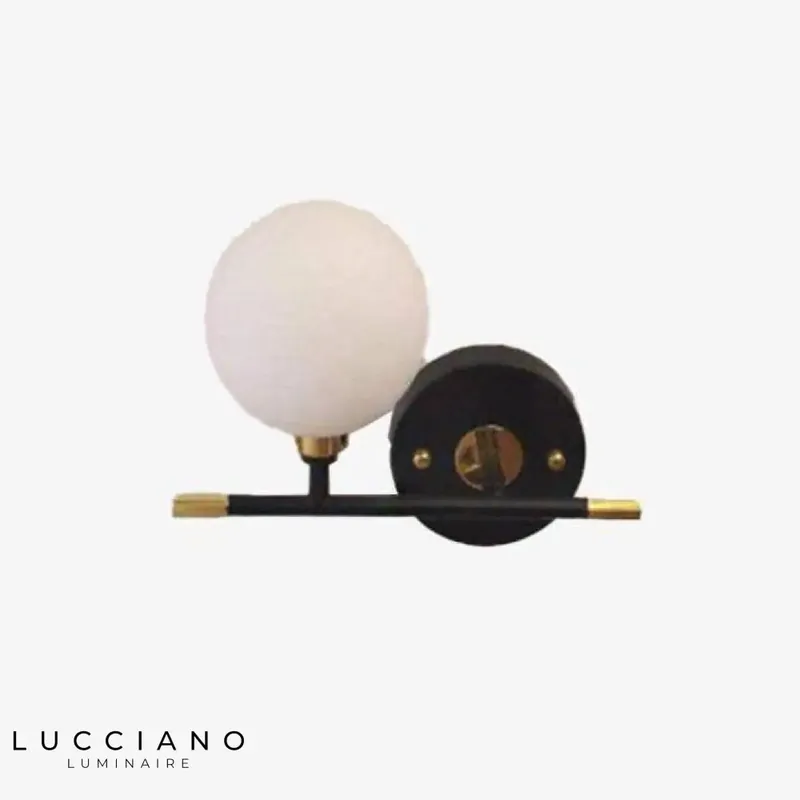 Bedroom wall light with glass sphere
