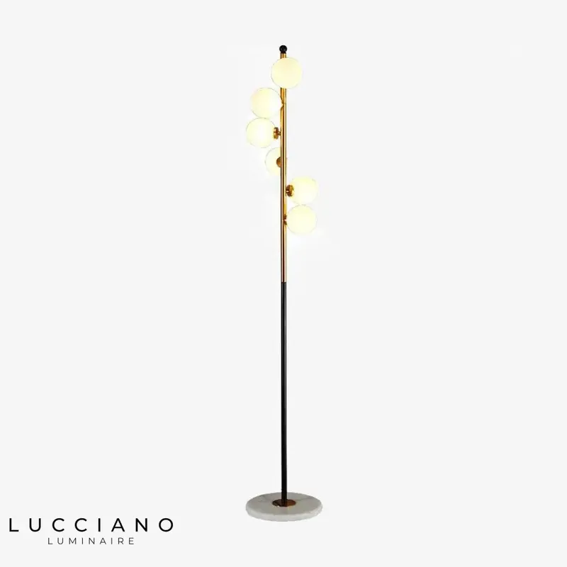 Gold LED floor lamp with glass globe
