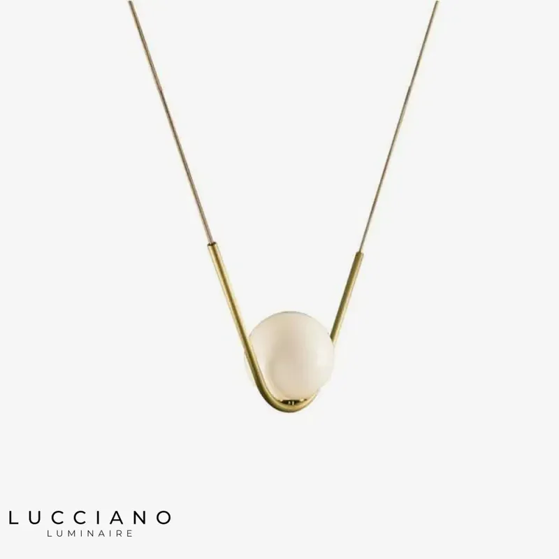 Suspended design: gilded metal, glass