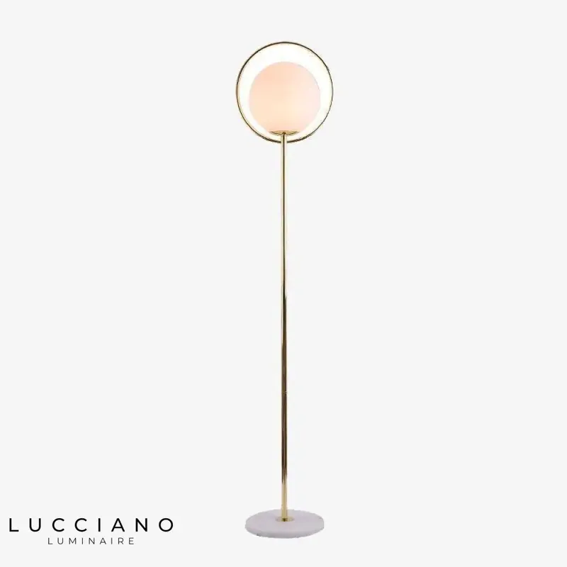 Gold LED floor lamp with glass globe