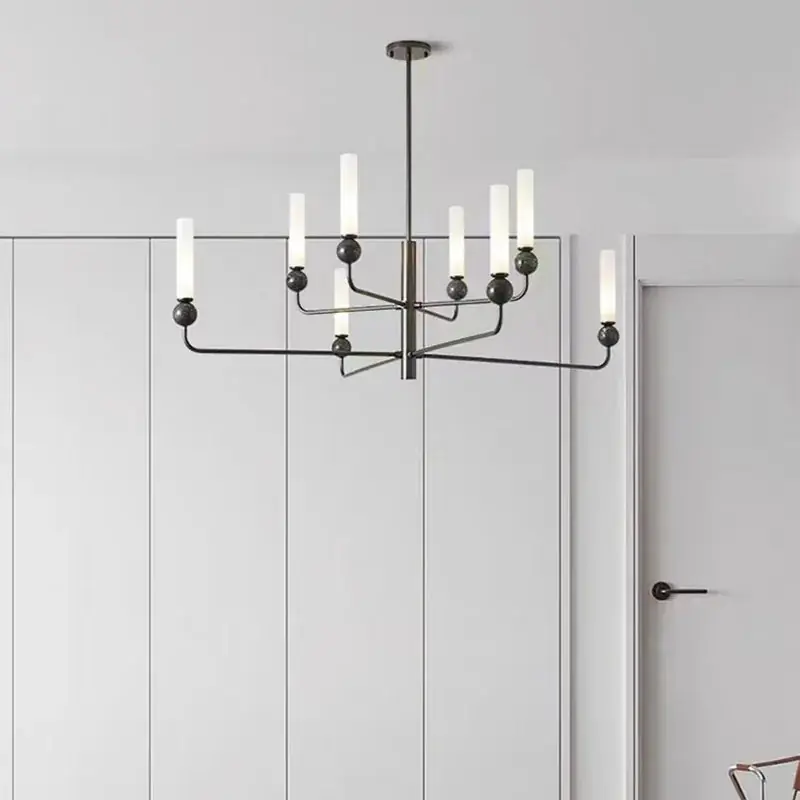 Modern and minimalist brass chandelier with acrylic globe