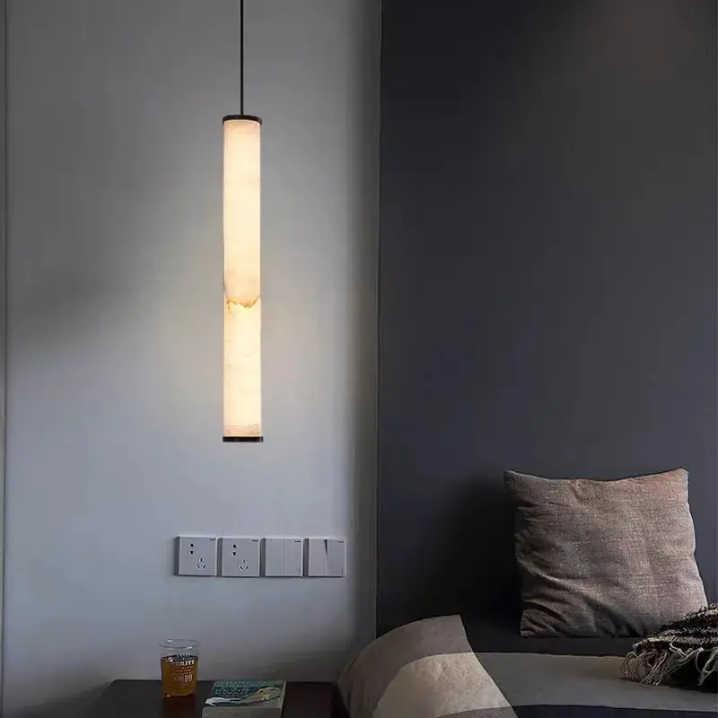 Cylindrical natural marble pendant light with adjustable cord