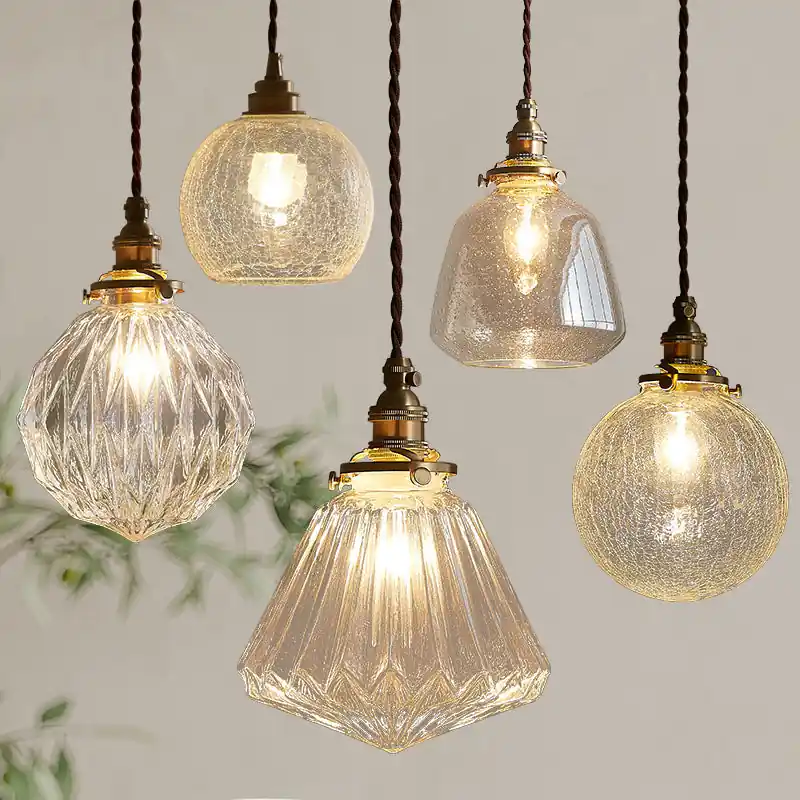 Vintage one-light glass globe pendant light with copper accents