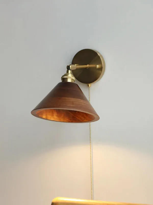 Vintage one-light wall sconce in wood and brass