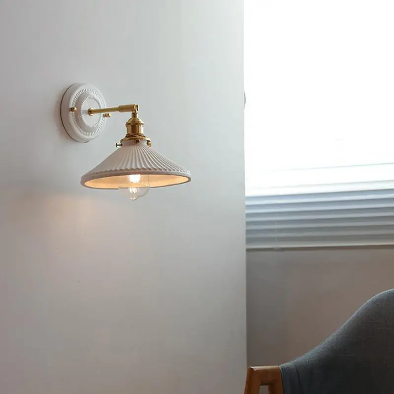 One-light vintage Japanese ceramic and brass wall sconce