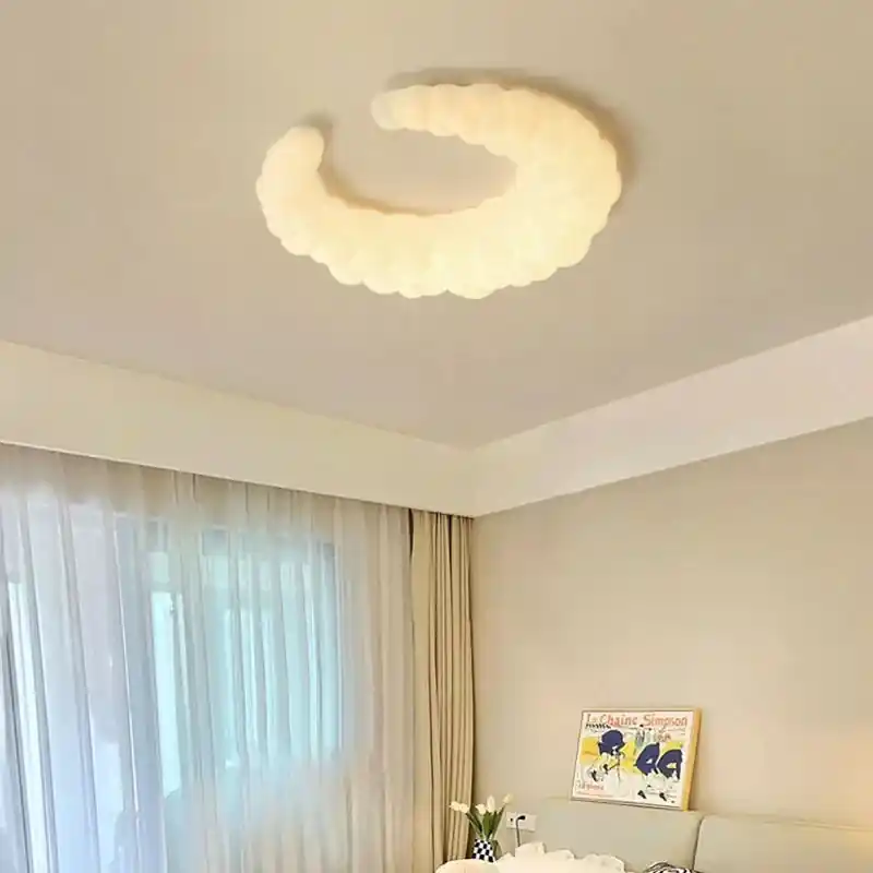 Soft cloud chandelier baby room